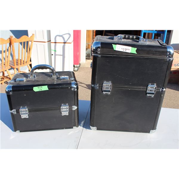 Two black crafting tool boxes - one on wheels - (more smaller boxes inside)