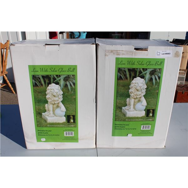 Pair of New in Box solar lion lawn ornaments