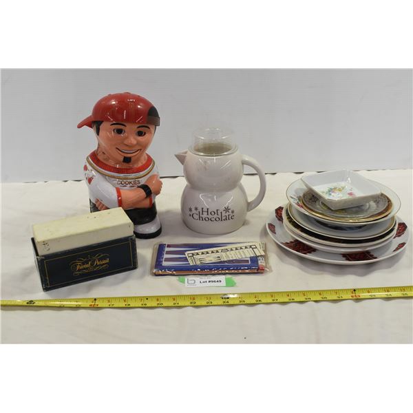 *Rapper Cookie Jar, Hot Chocolate Pot, Trivial Pursuit, Stack of Plates