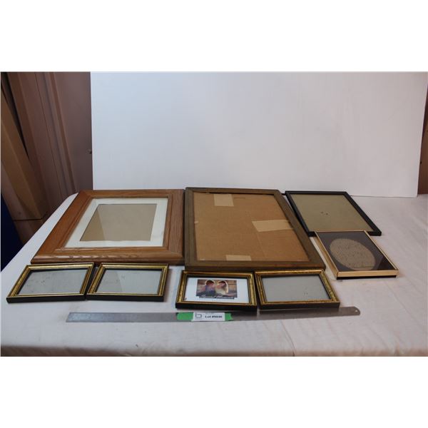 Lot of various sized photo frames
