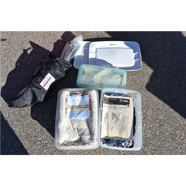 box with plastic totes of cloth items + Free standing design wall