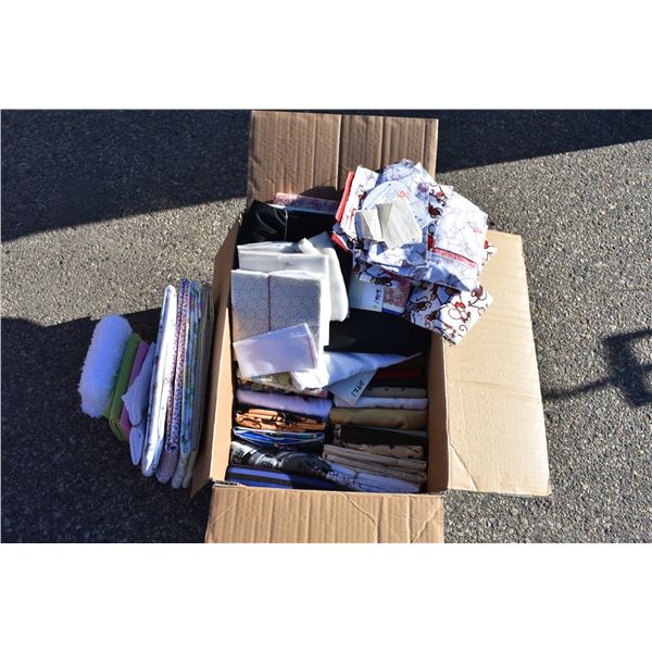 microwave box that is filled with various patterned fabric