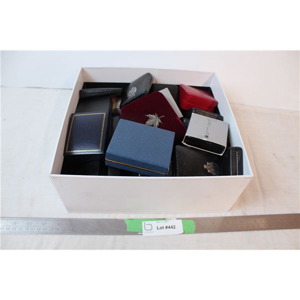 Box of empty coin holders