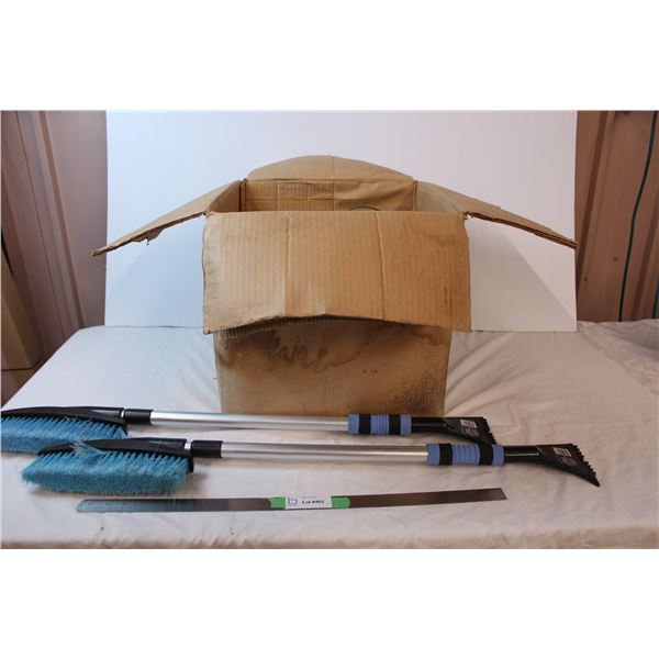 *snow scraper brushes + box of old holiday lights