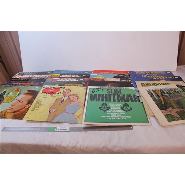 Lot of records; Slim Whitman, Conway Twitter, Dolly Parton