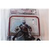Image 2 : Patrick Roy McFarlane’s figure (sealed in packaging)