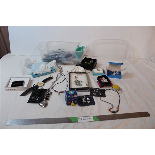 Assorted Jewelry, Covergirl unopened make up in plastic tote, Nixon buckle