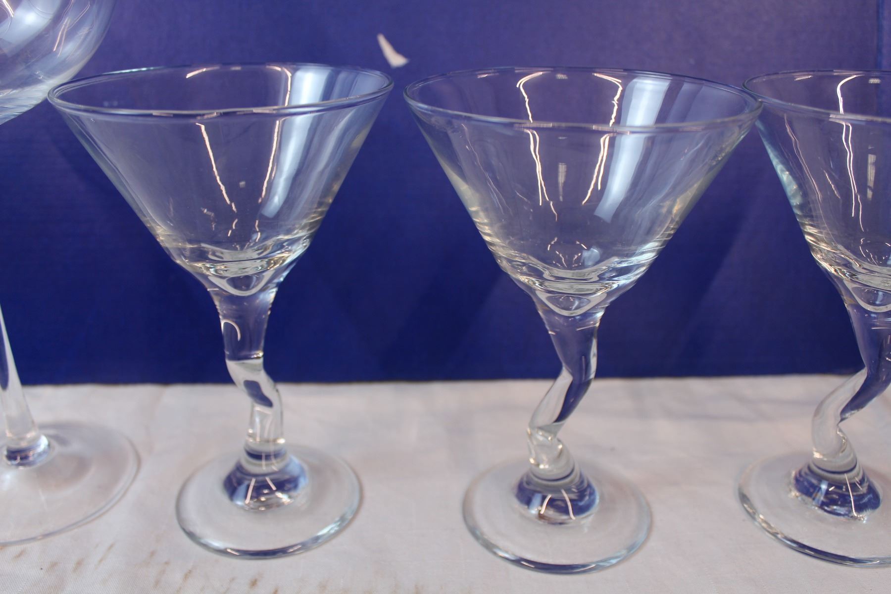 Martini glasses with crooked stems, brandy glasses