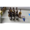 Image 1 : beer dispenser top + labelled beer bottles