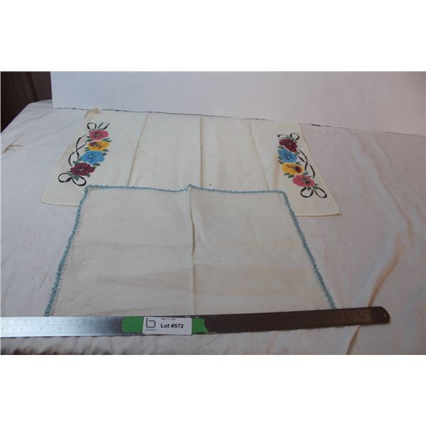 Two vintage cloth place mats, one hand painted