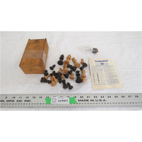 vintage wooden chess pieces in wood box