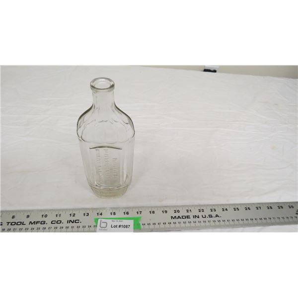 unusual shape Dr. Peter Fahrney medicine bottle (10" tall)