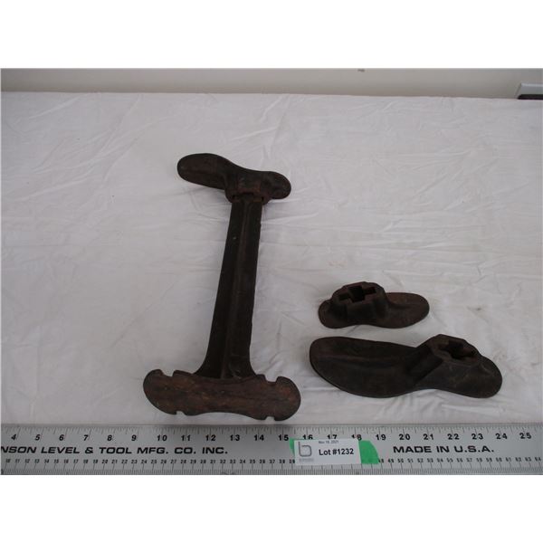 antique cast iron shoe molds + stand