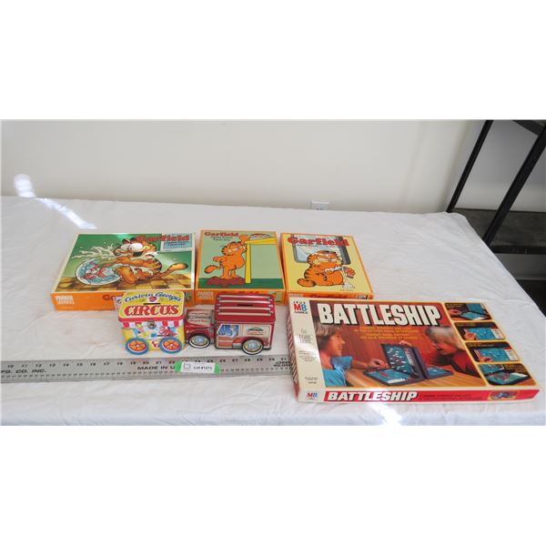 tin toy banks, misc puzzles, battleship game (not complete)