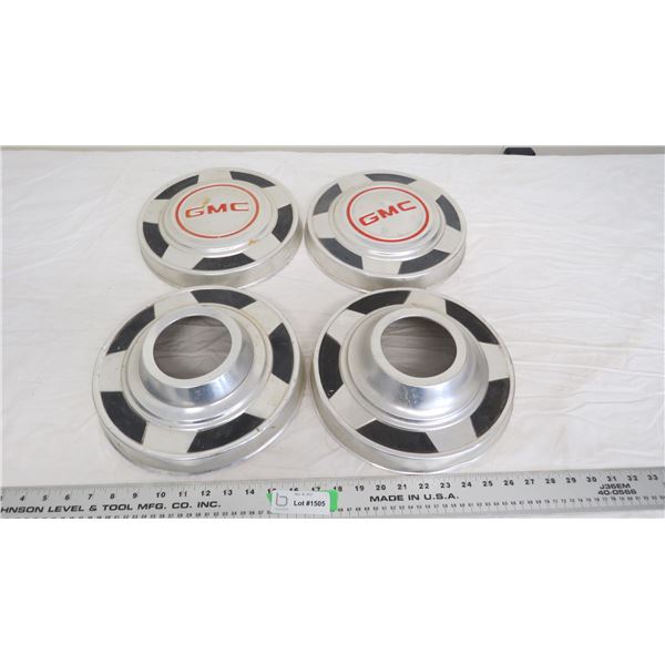 (4) vintage hubcaps