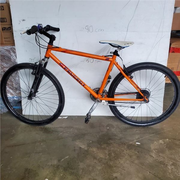 Orange peugeot bike