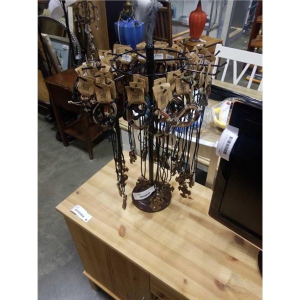 60 NEW PIECES JEWELRY ON SPINNING RACK - LEATHER NECKLACES AND BRACELETS