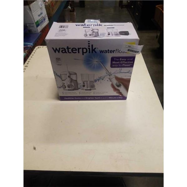 AS NEW WATERPIK ULTRA WATER FLOSSER