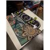 Image 1 : WELCOME MAT, SKATEBOARD AND TENNIS RACKET