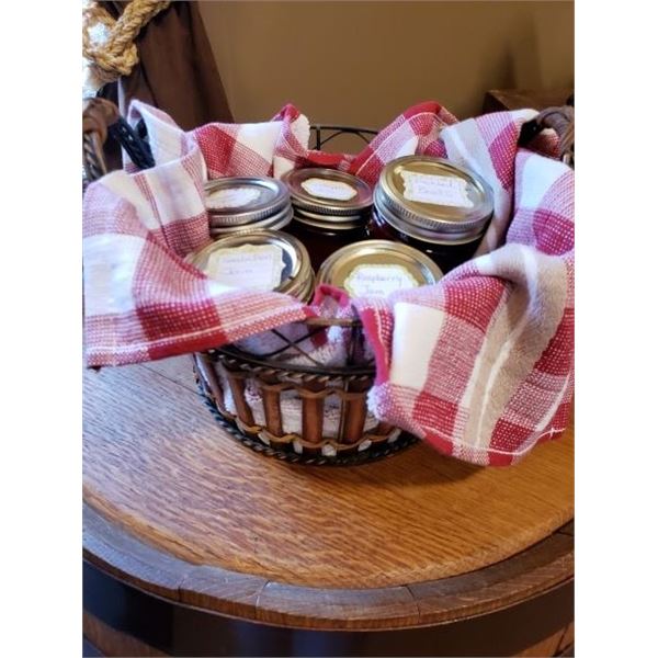 Assortment of Fruit Jams and a Jar of Pickled Beets