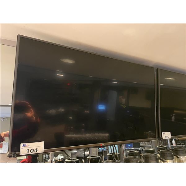 LG 42  LED WALL MOUNTED TELEVISION WITH WALL MOUNT, POWER CORD, AND CABLES