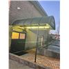 Image 2 : CURVED BLACK METAL ILLUMINATED ENTRANCE AWNING