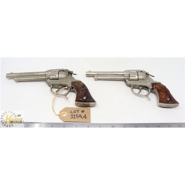 LOT OF 2- LESLIE HENRY "SMOKY JOE" METAL TOY CAP