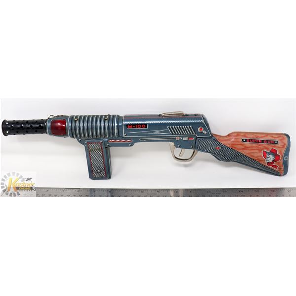 ANTIQUE TIN LITHOGRAPHED/ WIND UP M-100 SUPER GUN