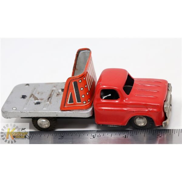 T.N. MADE IN JAPAN RED TIN LITHOGRAPHED FLAT BED