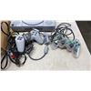 Image 2 : PLAYSTATION 1 WITH 2 CONTROLLERS AND 7 GAMES