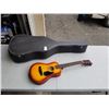 Image 1 : LEATHER GUITAR CASE AND FIRST ACT YOUTH ACOUSTIC GUITAR