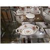 Image 2 : PETIT POINT TEAPOT, CREAM AND SUGAR, 6 CUPS AND SAUCERS, CAKE PLATE AND SANDWICH TRAY