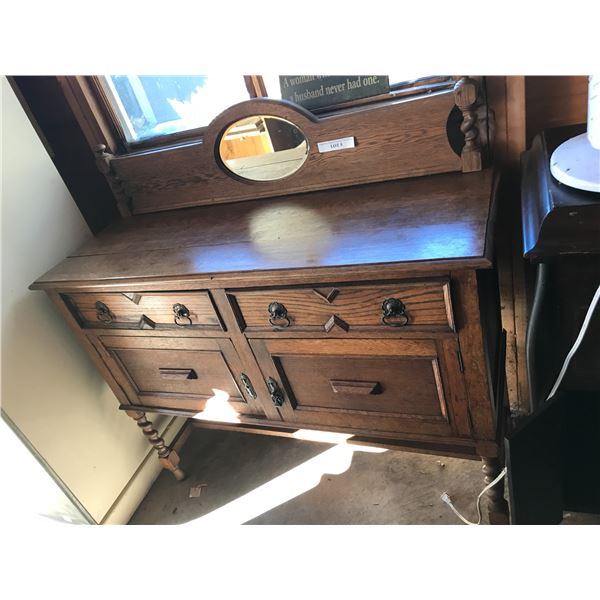 Vintage wood cabinet with oval mirror