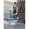 Image 1 : Golfer lawn ornament, round wooden table, vintage bicycle pump, vintage oil lantern base, vintage wa