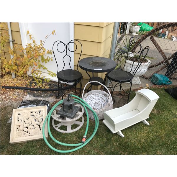 Black metal outdoor table & 2 chairs, wooden doll cradle, garden hose, garden accessories, 24" unive