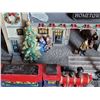 Image 2 : Lemax Christmas train station features lights and music.