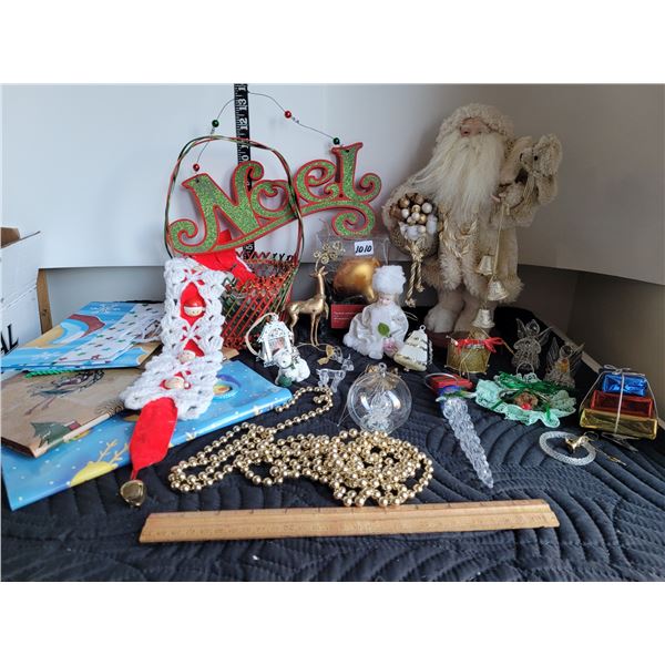 Christmas decor. Gift bags, glass ornaments, St Nicholas, basket with misc.