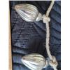 Image 3 : Vintage Kugel style bulb garland features individually tied bulbs on a rope.
