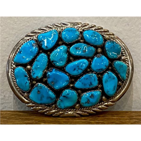 Hallmarked JP here is a 18 stone turquoise belt buckle