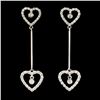 Image 1 : 18K Gold 0.68ctw Diamond Earrings