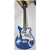 Image 1 : BLUE ELECTRIC GUITAR MISSING A STRING.