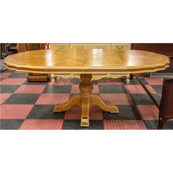 SOLID OAK DINING TABLE W/2 LEAVES APPROX 48" DIAME