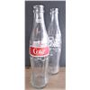 Image 1 : Two Coca-Cola Bottles