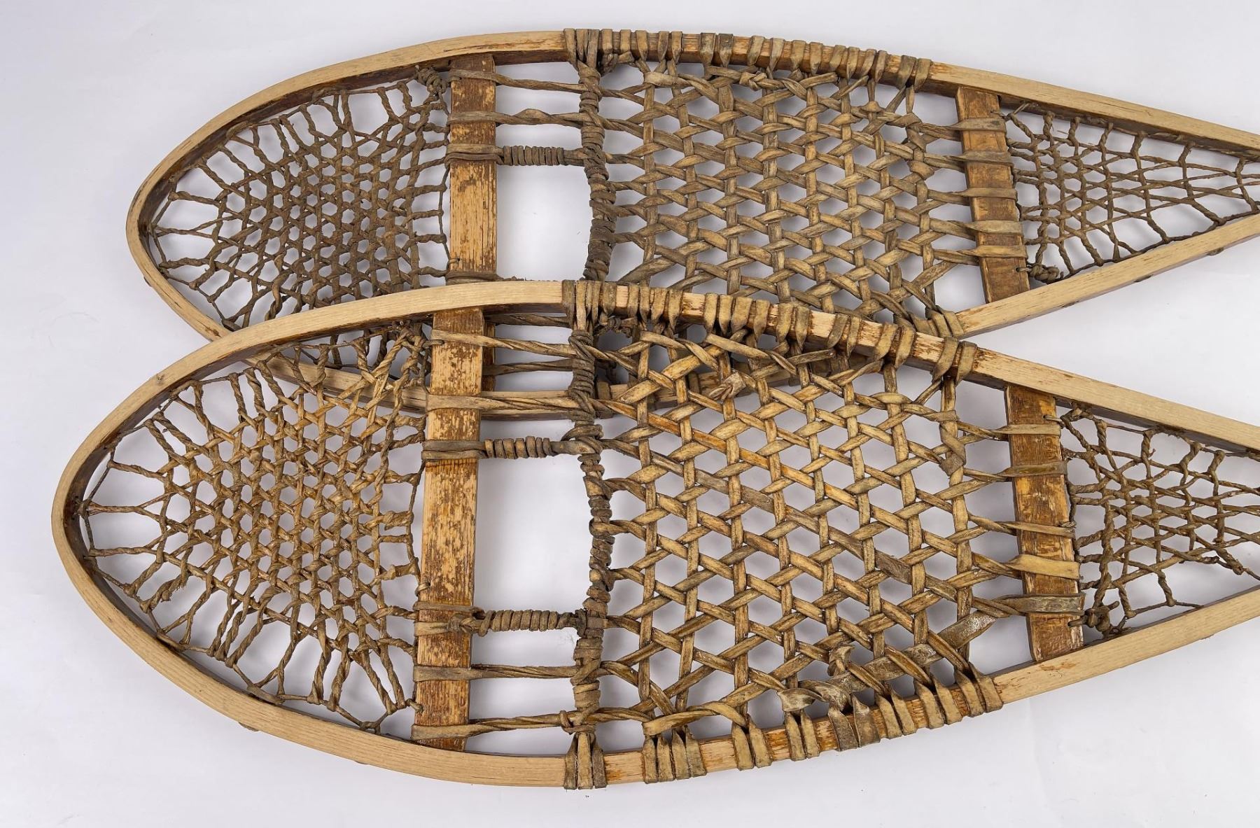 Pair of Antique Leo Tomah Indian Snowshoes