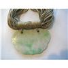 Image 1 : VINTAGE JADE PENDANT on MULTI-SILK CORDS #2274290