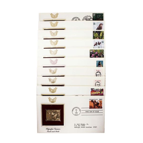 Lot of (10) First Day Of Issue 22KT Gold Replica Stamps in Envelopes