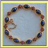 Image 1 : ANTIQUE BLUE ENAMEL 18K GOLD AND RUBY BRACELET #2247136
