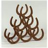 Image 1 : CAST IRON HORSESHOE WINE RACK / NEW #2270946