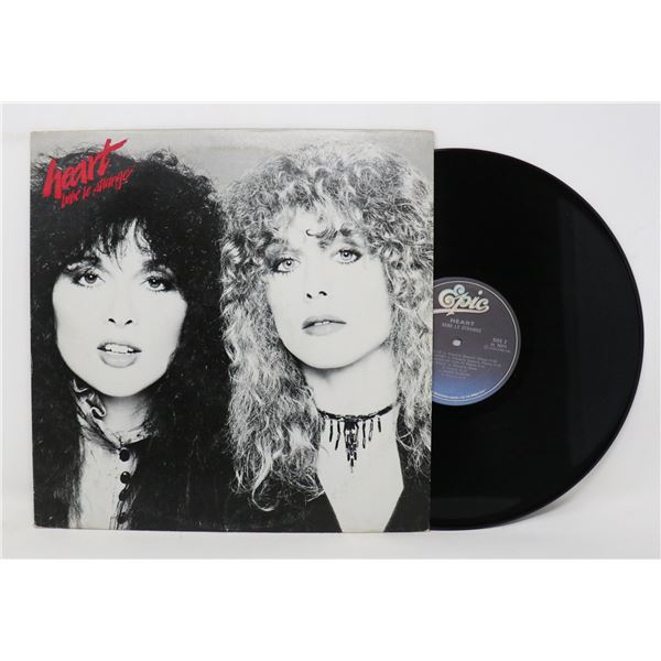 BEBE LE STRANGE HEART 1980 FE 36371