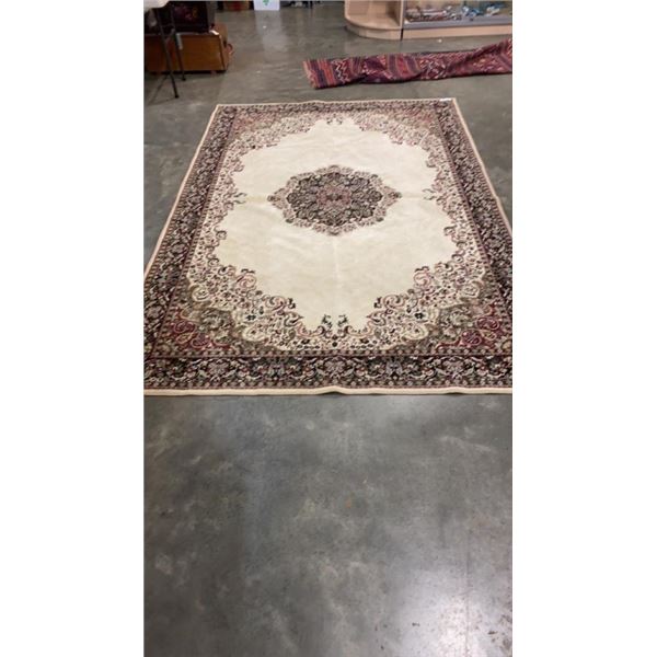 BEIGE AREA CARPET 116 X 78 INCHES